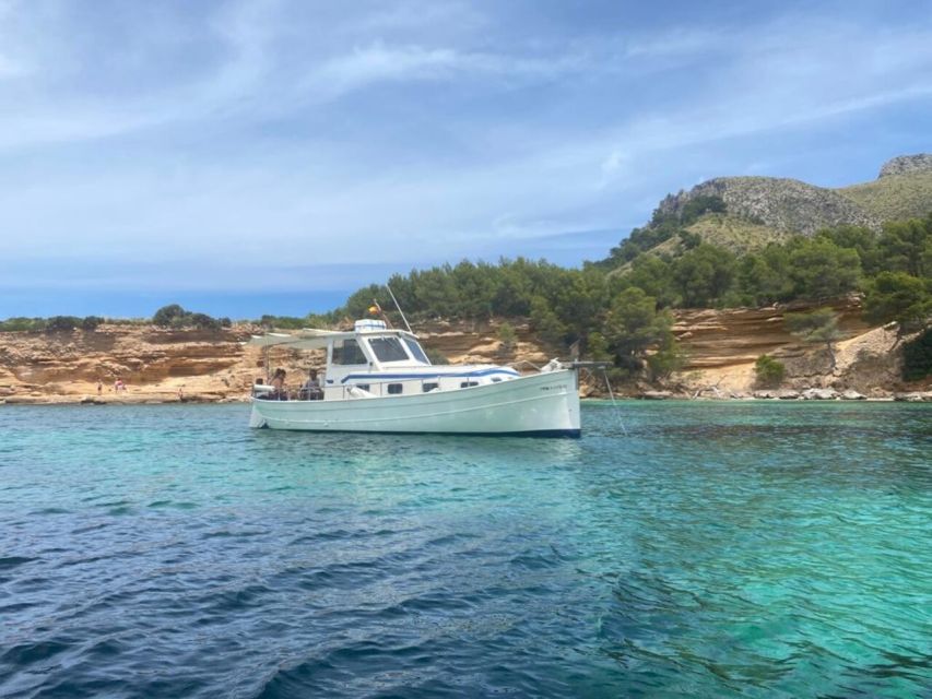 Alcudia: Traditional Wooden Boat Trip with Snorkeling - Along the northern coast toward Aucanada