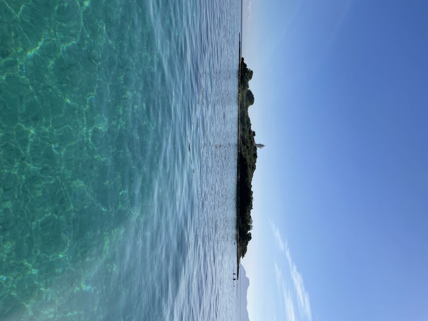 Alcudia: Traditional Wooden Boat Trip with Snorkeling - A Mallorcan snack with a sea view