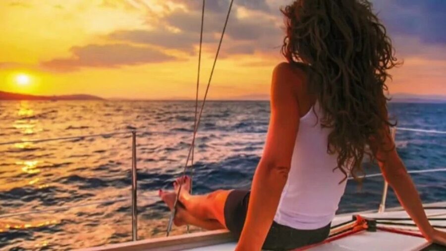 Barbate: Sunset Cruise with Glass of Cava - The lighthouse, cliffs, and changing light