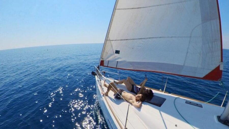 Barcelona: 2-Hour Sunset Sailboat Trip - Paddle Boarding and Floating Toys