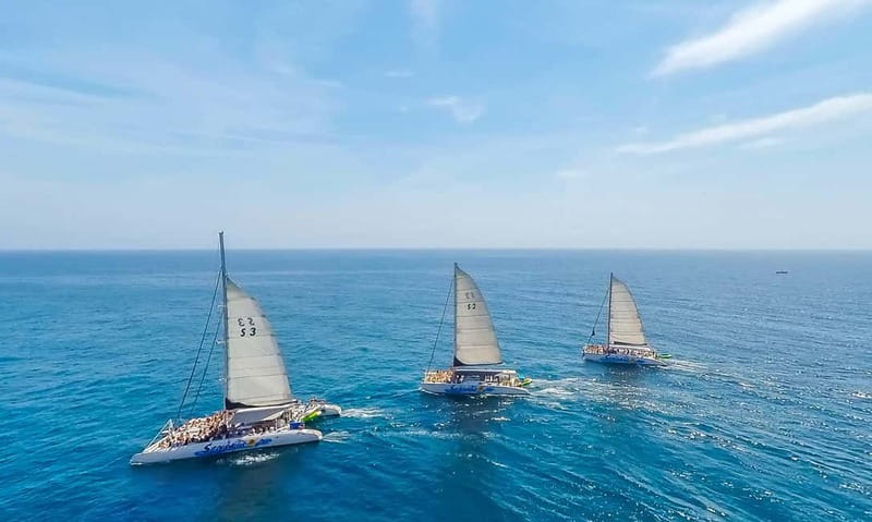 Barcelona: Catamaran Party Cruise with BBQ Meal - Setting sail from Port Olímpic