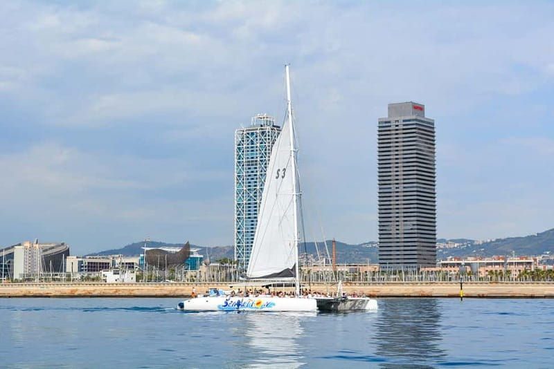 Barcelona: Catamaran Party Cruise with BBQ Meal - What is served on the 11 AM and 2:30 PM sailings