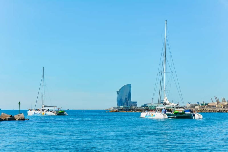 Barcelona: Catamaran Party Cruise with BBQ Meal - Music, dancing and the crew
