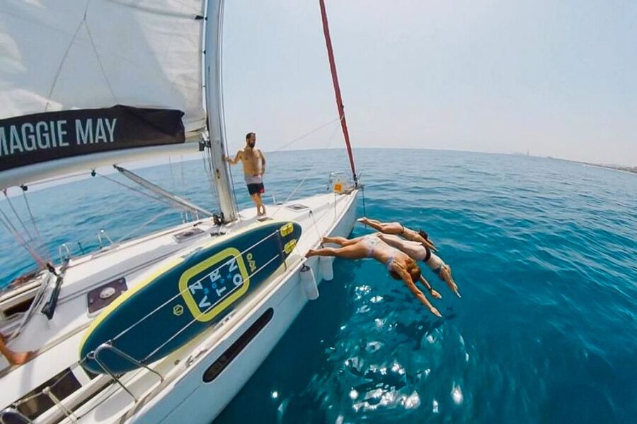 Barcelona: Coastline Boat Trip with Snacks and Cava - The swimming stop and what conditions mean