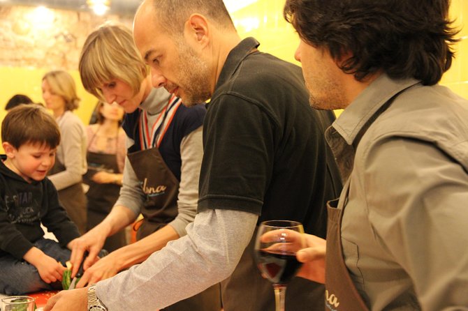 Barcelona Culinary Experience: Paella & Tapas Cooking Class - Wine, conversation, and the group atmosphere