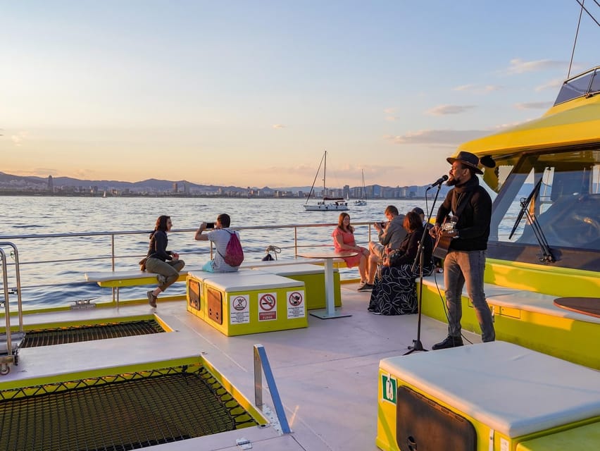 Barcelona: Daytime or Sunset Catamaran Cruise with Music - Weather, cancellations, and timing tips