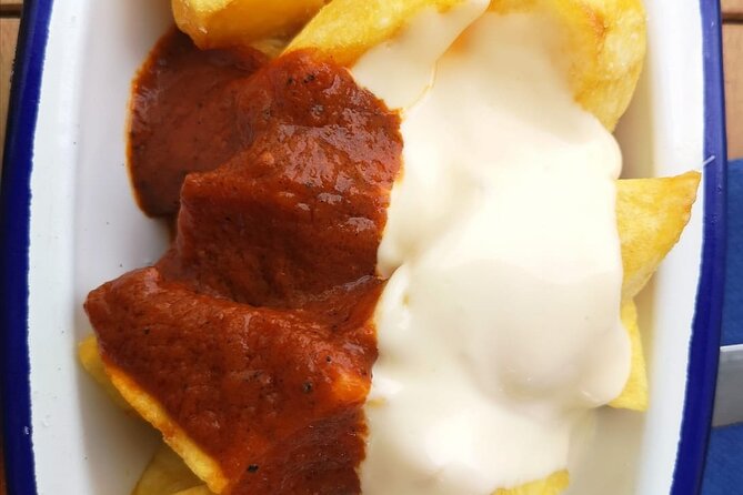 Barcelona Food Tour: Tapas, Drinks and Delights with a Local - Carrer del Regomir and the Catalan basics