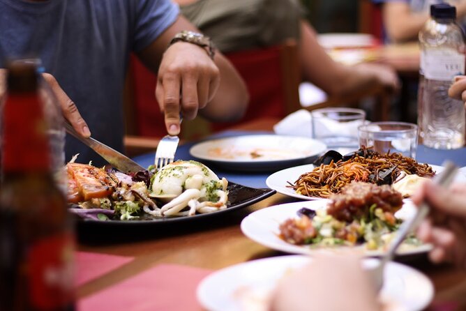 Barcelona Food Tour: Tapas, Paella, Sangria & 8+ Local Tastings - Starting with Barcelona’s old stones