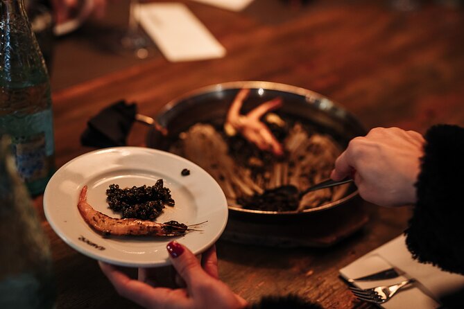 Barcelona: Guided Food Walking Tour with Tapas and Wine - Roman Walls and the Walk Into El Born