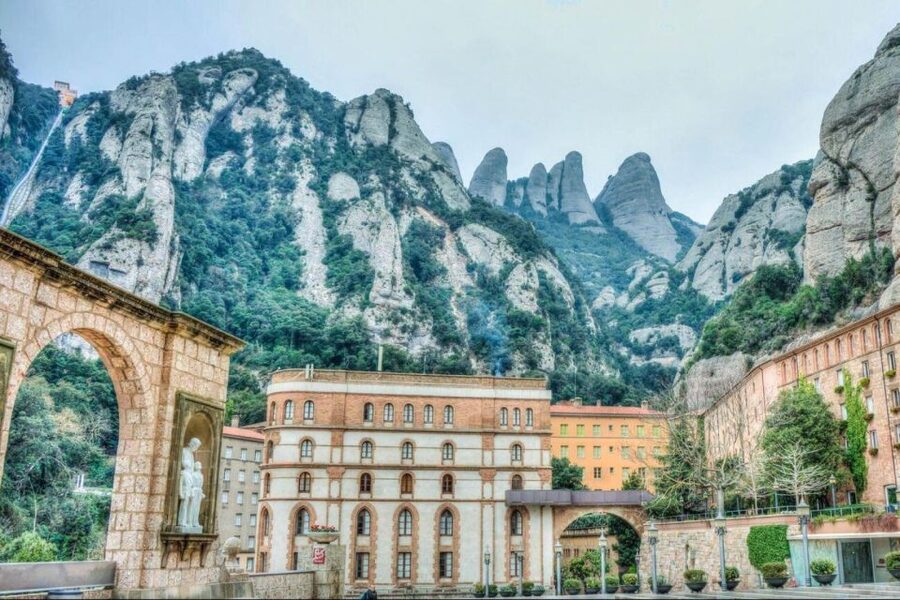 Barcelona: Montserrat Tour with Transport & Basilica Option - The monastery and its mountain setting