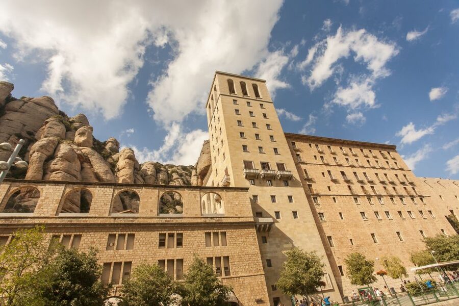 Barcelona: Montserrat with Winery Visit and Farmhouse Lunch - Montserrat: sanctuary, stone, and wide views
