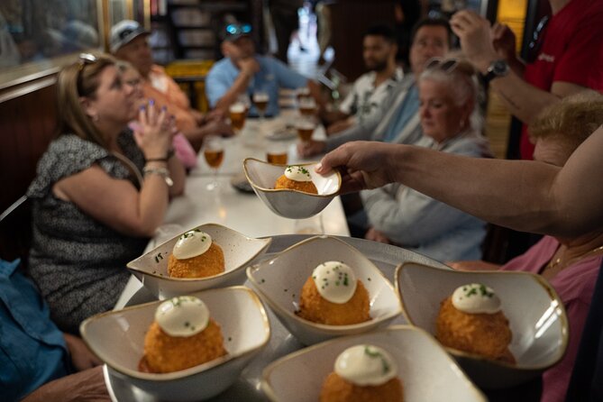 Barcelona Old Town Tapas Tour: Vermouth, Bites & Hidden Gems - Finishing beside the Cathedral with vermouth