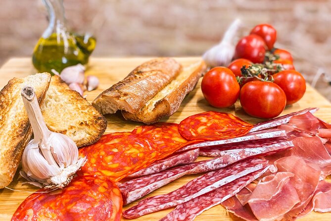 Barcelona Paella Cooking Class & Boqueria & Hofmann-Trained Chefs - Eating your own work with the group