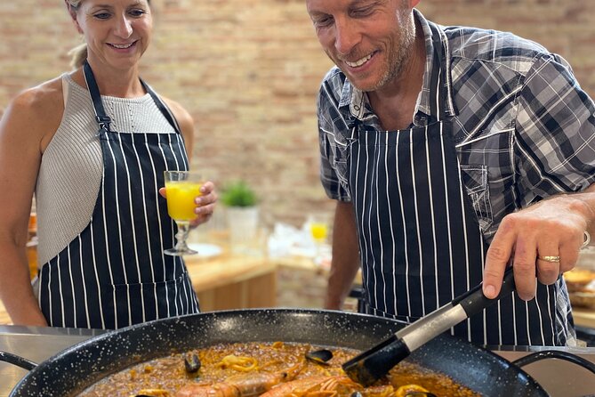Barcelona Paella Cooking Class & Boqueria & Hofmann-Trained Chefs - The antique studio and the first Catalan bites