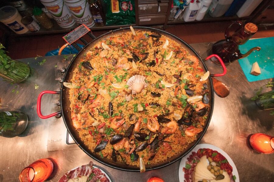 Barcelona: Paella Cooking Experience & Boqueria Market Tour - Pan con tomate, pintxos, and the first glass of sangria