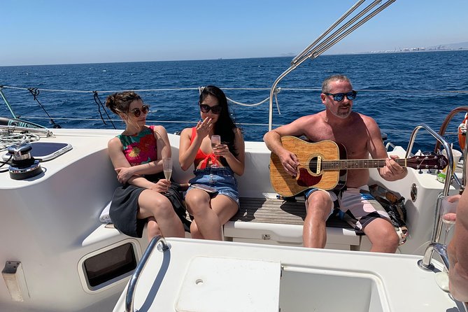 Barcelona Private Sailing Tour with Drinks for Family and Friends - Swimming, inflatables, and open-water conditions