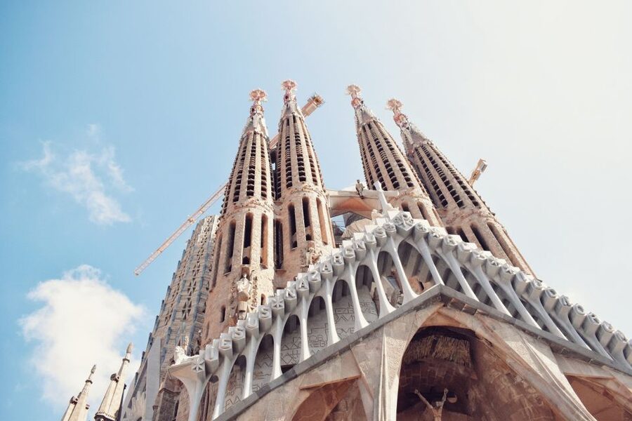 Barcelona: Sagrada Familia Guided Tour with Tower Access - Museum access and the story of an unfinished work