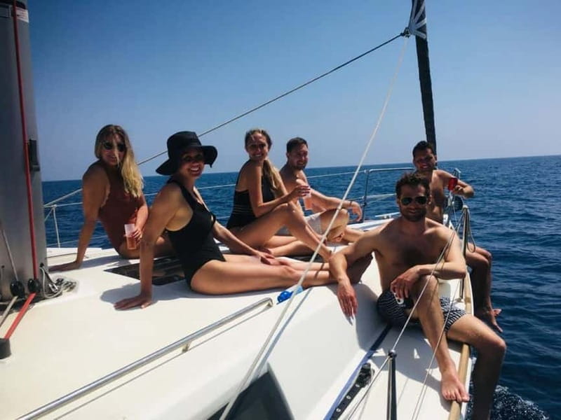 Barcelona: Sailing Tour with Tapas, Drinks and Swim Stop - The first hour: harbor views and open-water sailing