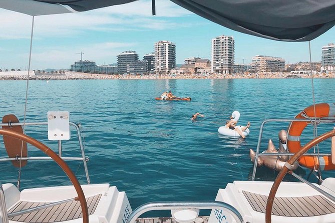 Barcelona Small Group Sailing with Snacks and Cava - Reading Barcelona from the Mediterranean