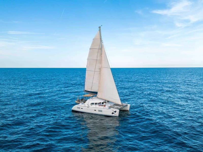 Barcelona: Sunset Catamaran Cruise with Wine and Tapa - The atmosphere is friendly, not rowdy