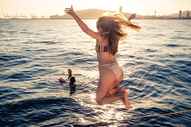 Barcelona Sunset Cruise with Light Snacks and Open Bar - Sunset Views Toward Sagrada Família, Tibidabo, and Montjuïc