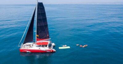 Sunset or Day Catamaran Cruise with Tapa & Drink