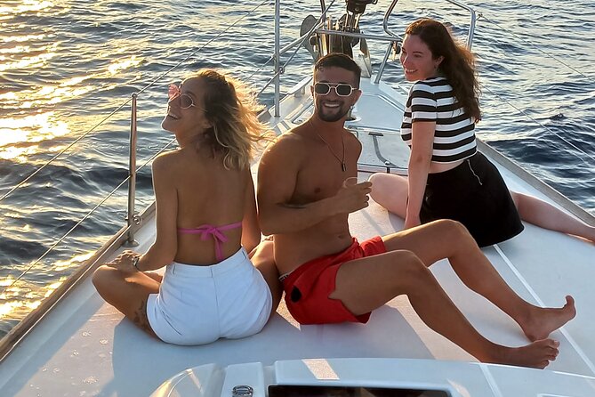 Barcelona Sunset Sailing Cruise from Port Olímpic with Open Bar - Maremagnum and the white commercial-port drawbridge