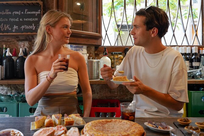 Barcelona Tapas and Wine Experience Small-Group Walking Tour - Walking toward El Born and the Passeig del Colom