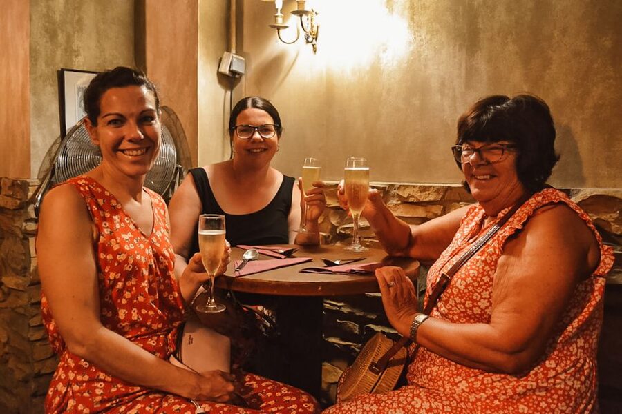 Barcelona: Tapas Walking Tour with Food, Wine, and History - Walking through the Gothic Quarter with a plate in hand