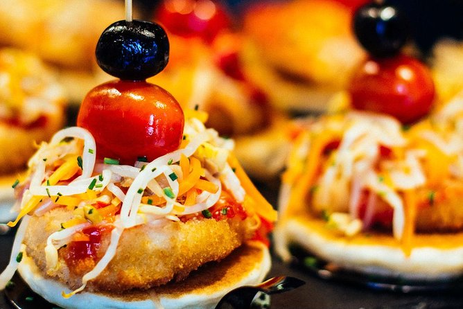 Barcelona With Locals: Wine and Tapas Private Tour - Meeting your host near Sant Antoni