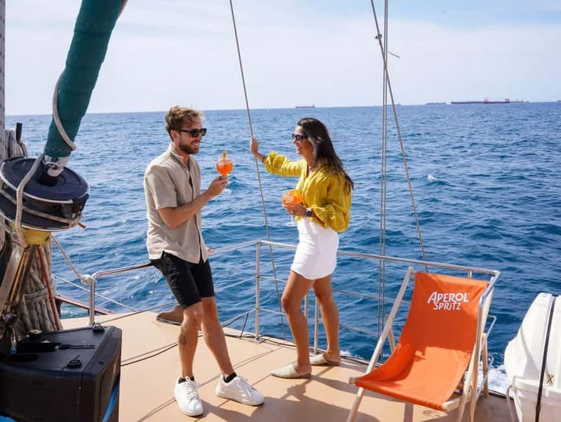 Barcelona: Wooden Boat Sailing with Tapa and Welcome Drink - Choosing the best seat onboard
