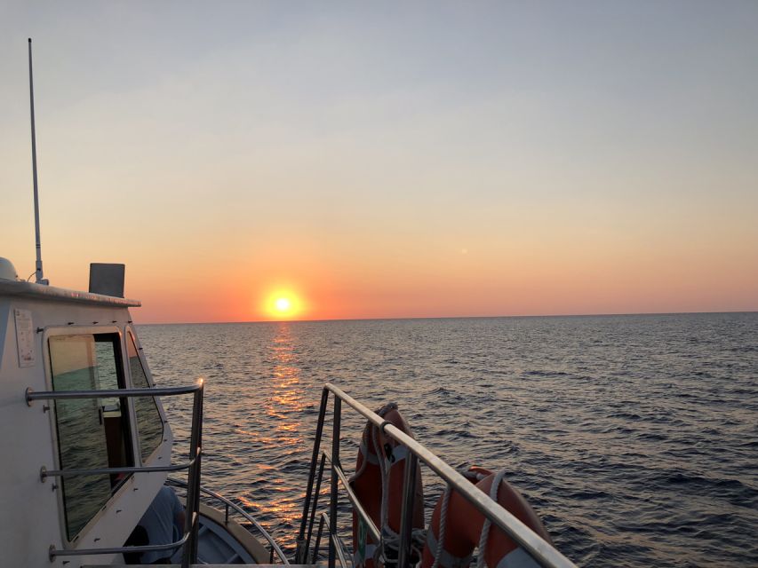 Cala'n Bosch: 2-Hour Sunset Sightseeing Tour - Sunset, cava, music, and the onboard bar