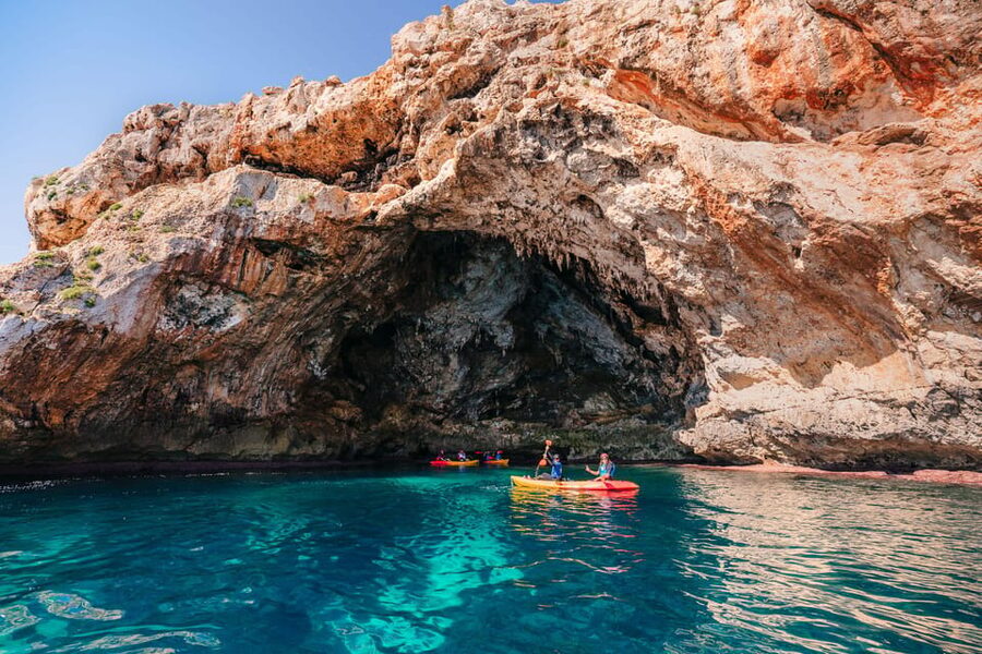 Cala Varques: Guided Sea Caves Kayak & Snorkeling Expedition - Paddling the coast toward Cala Falcó