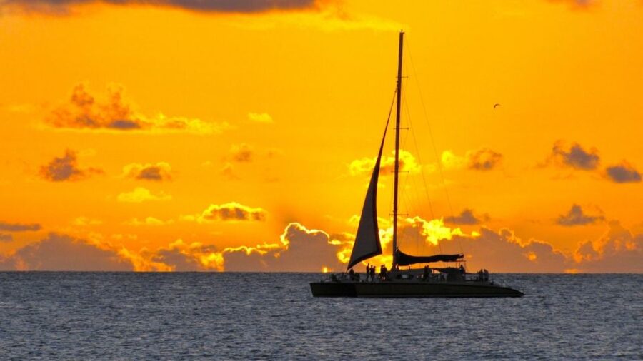 Cambrils: Costa Dorada Sunset Catamaran Cruise with Drinks - Drinks, Music, and the Catamaran Atmosphere