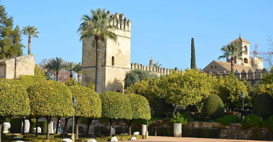 Cordóba: Gardens & Fortress of Catholic Monarchs Guided Tour - Inside the fortress: royal rooms and changing power