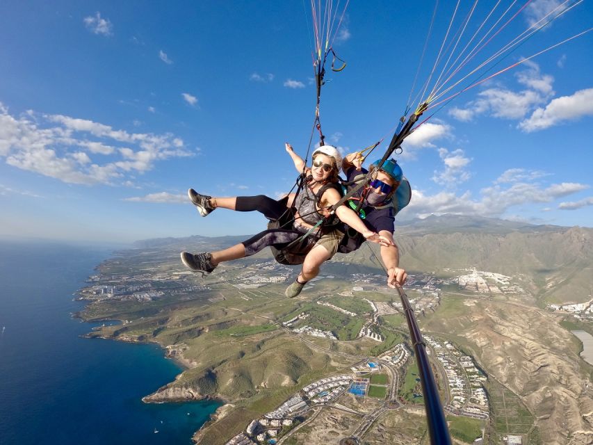 Costa Adeje: Tandem Paragliding Flight with Pickup - Taking off above South Tenerife