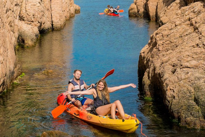 Costa Brava Kayak & Snorkel Tour + Picnic from Barcelona - Pebbles, sharp rocks, and the gear you need