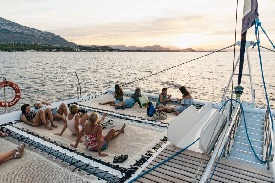 Dénia: Daytime or Sunset Catamaran Cruise - Leaving Puerto Dénia on the Mundo Marino catamaran