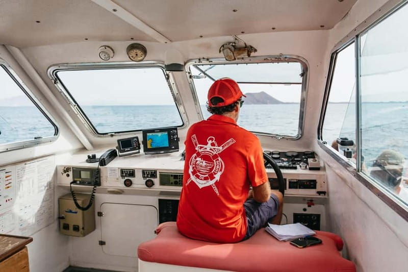 Desde Corralejo: Lobos Island Ferry with Optional Transfer - Swimming, snorkeling, fishing, and surfing