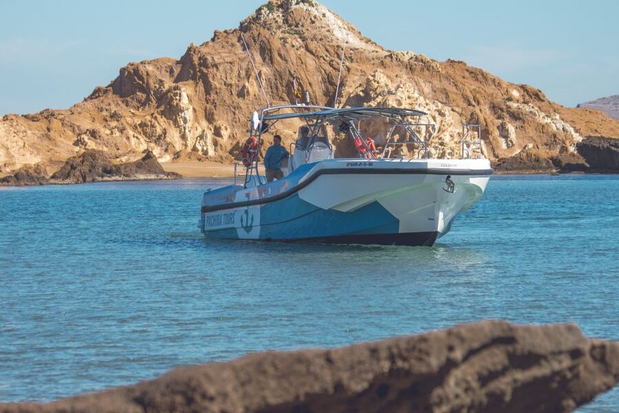 Fornells: 3-Hour Boat Tour Along Menorcan Coast - The eastern route: red beaches, caves, and clear water