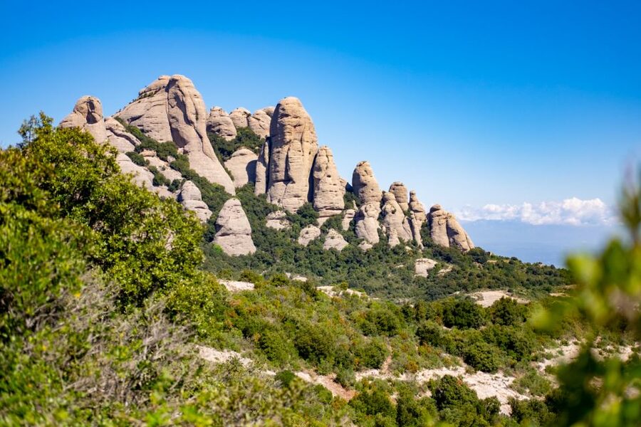 From Barcelona: Montserrat Monastery, Easy Hike, Cable Car - Riding above the mountain