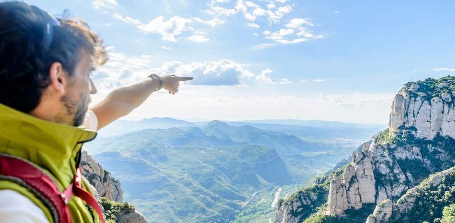 From Barcelona: Montserrat Monastery & Scenic Mountain Hike - Riding the funicular above Montserrat