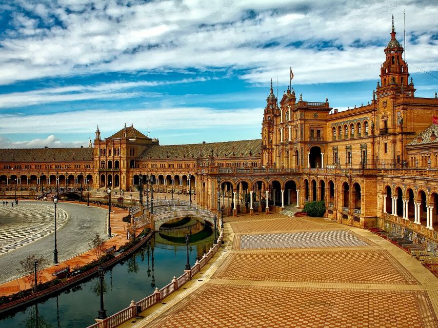 From Costa del Sol: Seville Day Trip - Walking through Barrio de Santa Cruz
