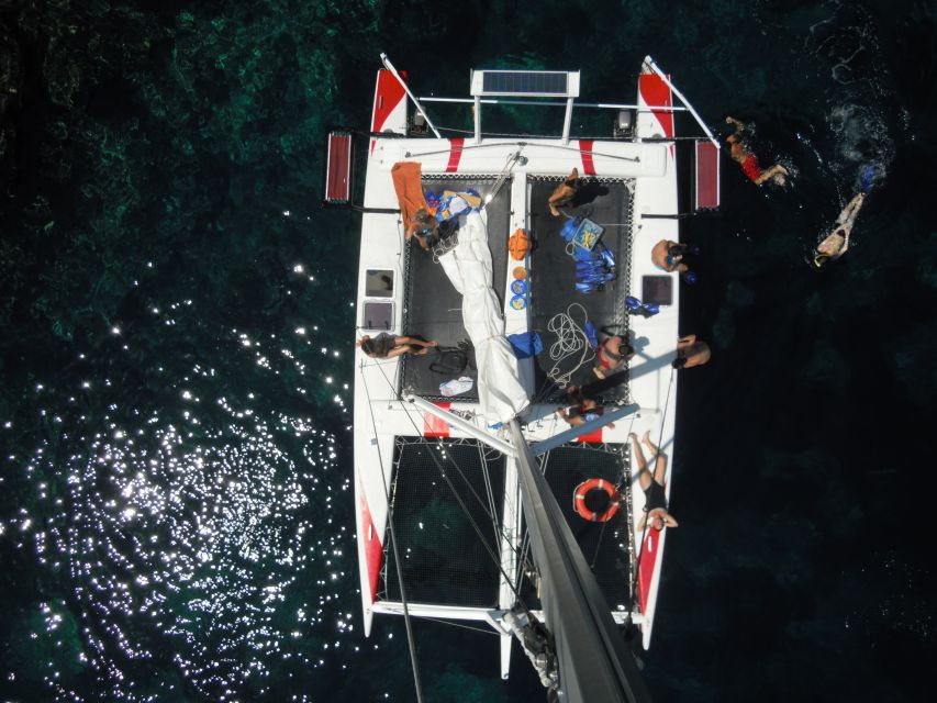 From Fornells: Half-Day Menorca Catamaran Trip w/ Snorkeling - What the guides add to the experience