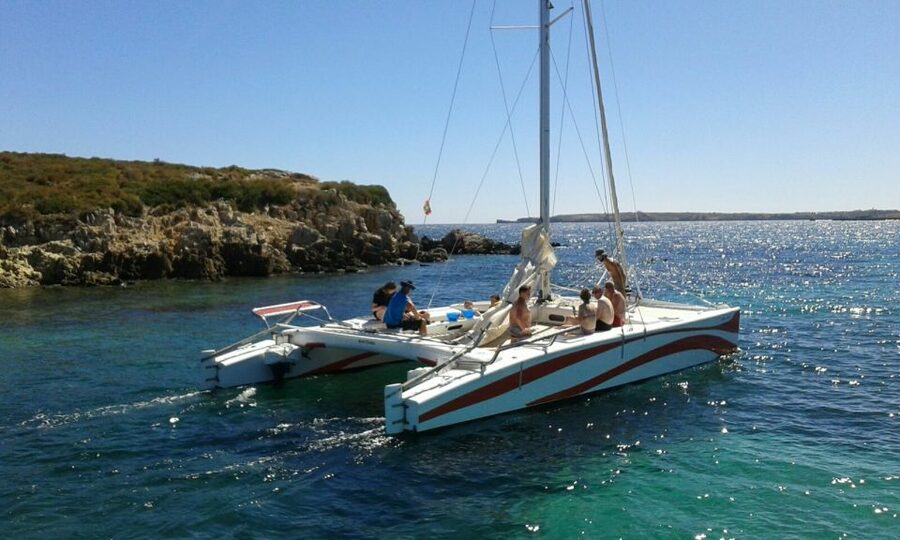 From Fornells: Half-Day Menorca Catamaran Trip w/ Snorkeling - Sailing without the usual holiday noise