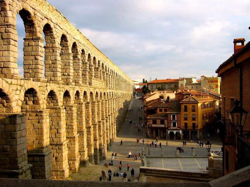 From Madrid: Guided Day Trip to Segovia and Toledo - Free time, panoramic views, and the Tagus