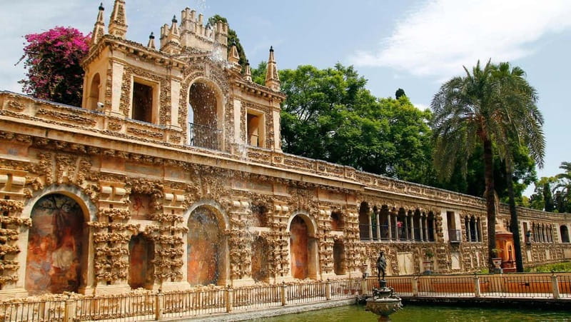 From Malaga: Seville Day Trip with Real Alcázar Tickets - Walking through Santa Cruz