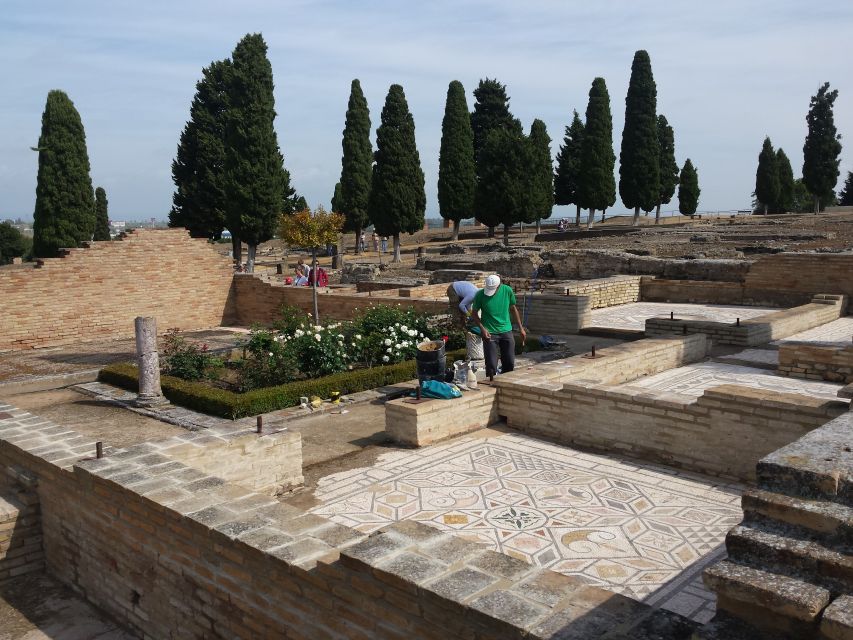 From Seville: Italica Roman City & Medieval Monastery Tour - Entering Italica, a city linked to Trajan and Hadrian