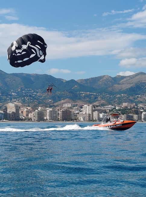 Fuengirola: Deluxe Parasailing Flight from Fuengirola Port - Boarding the specialized winch boat