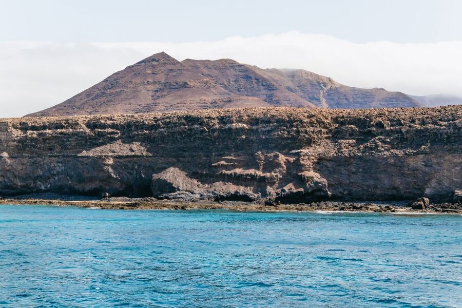 Fuerteventura: Glass Bottom Boat Cruise with Lunch & Drinks - Paella, Canarian flavors, and drinks on deck